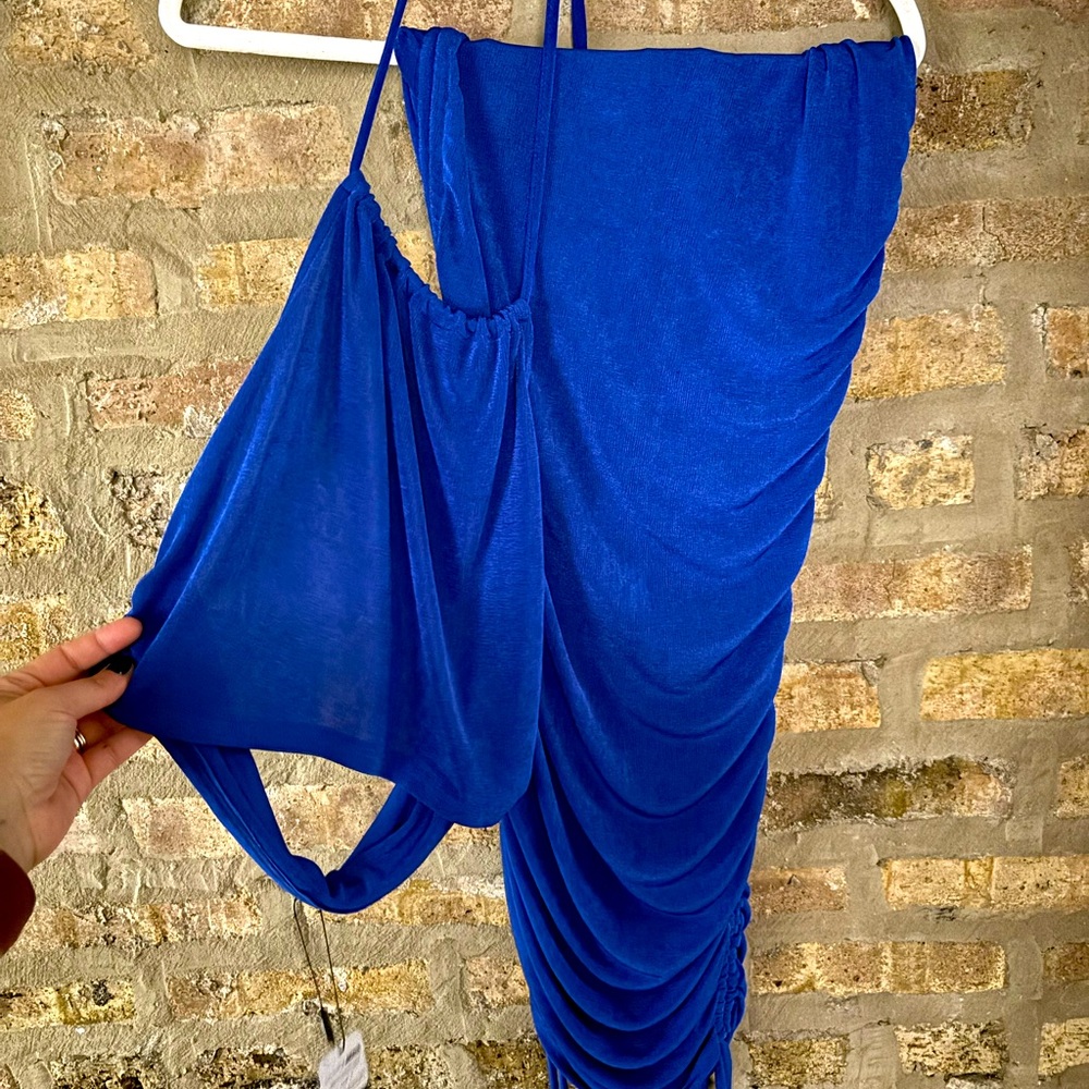 Two piece outfit. Halter top with matching skirt.
